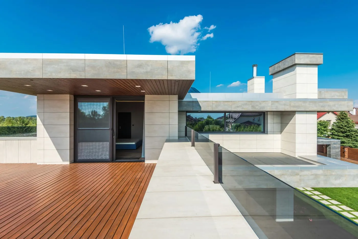 Large-format stone panels on a rooftop terrace.